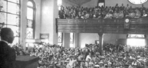 MLK preaching in a church full of people